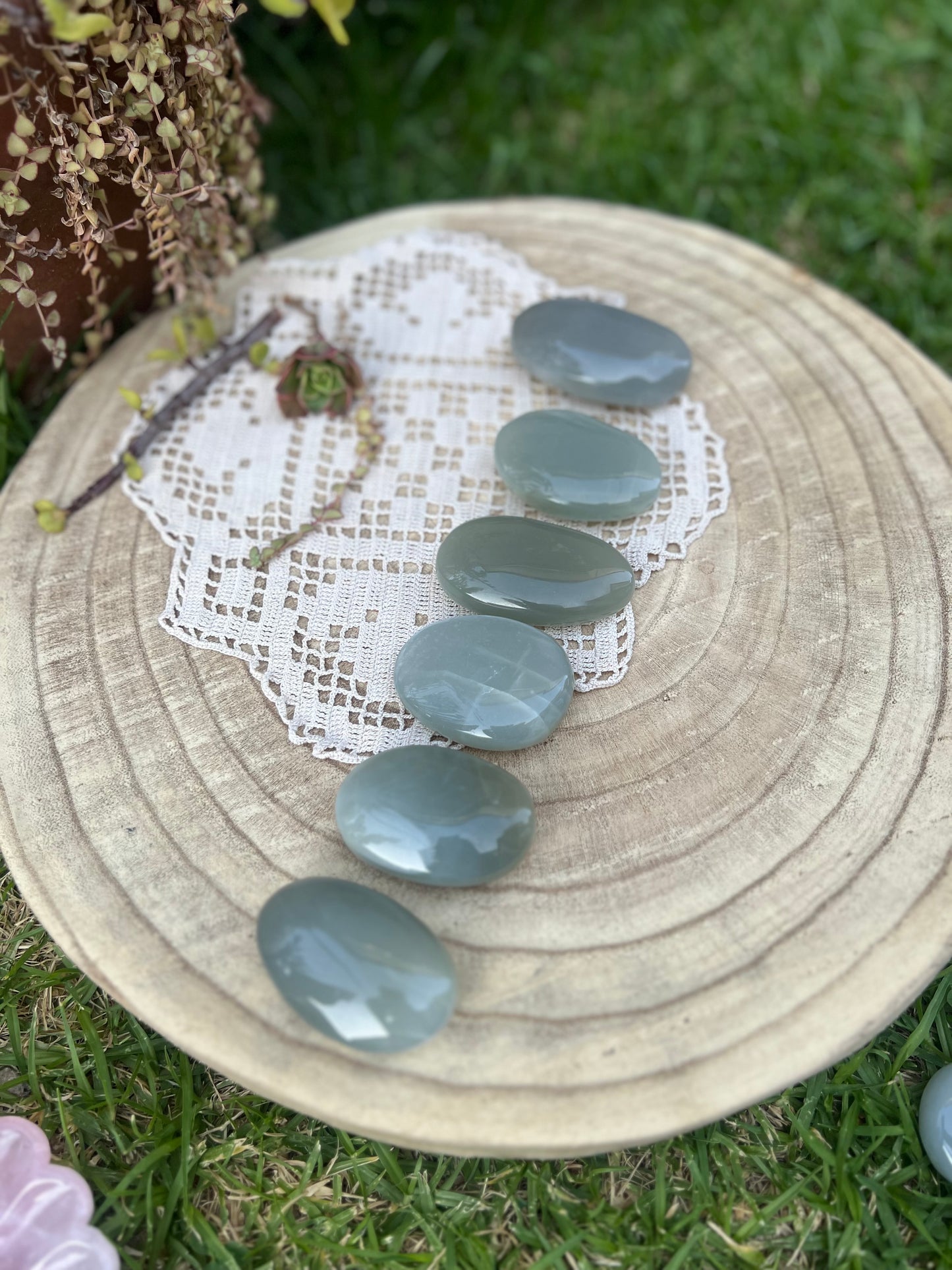 Green moonstone palm stones