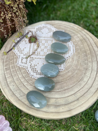 Green moonstone palm stones
