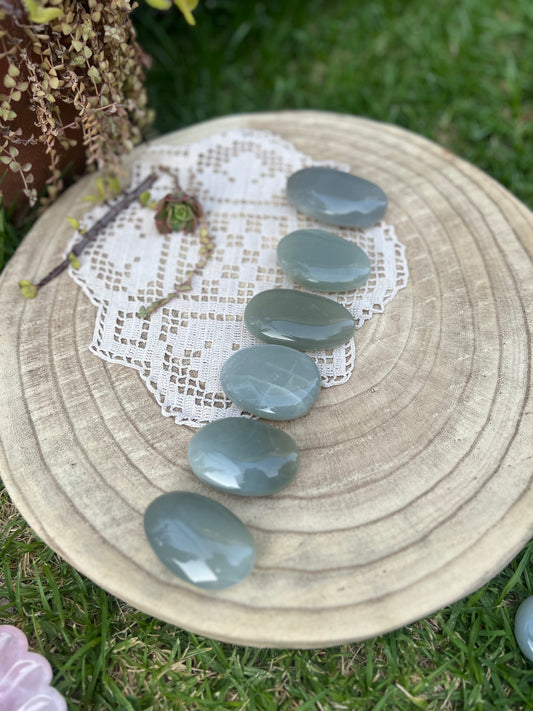 Green moonstone palm stones