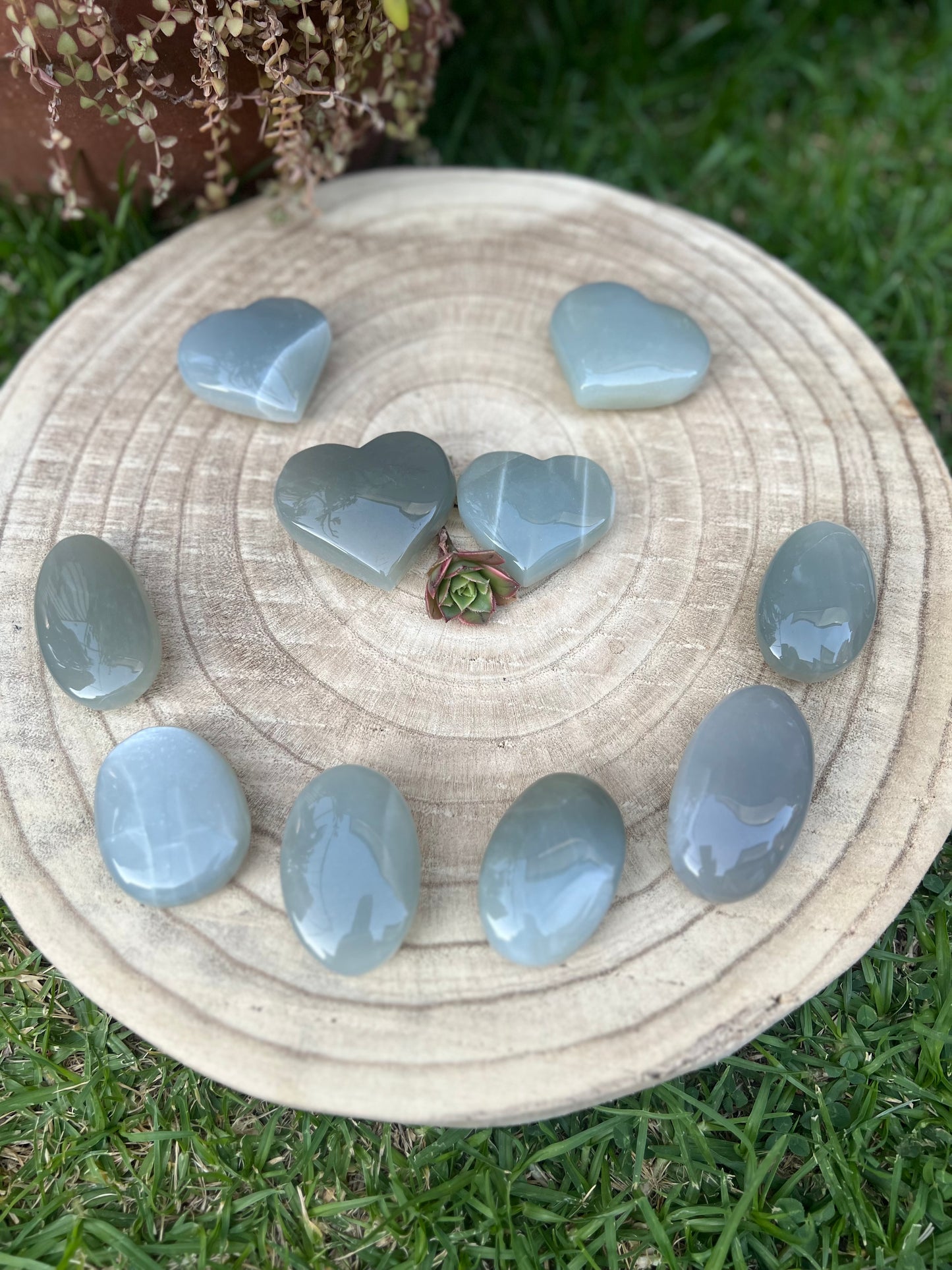 Green moonstone palm stones