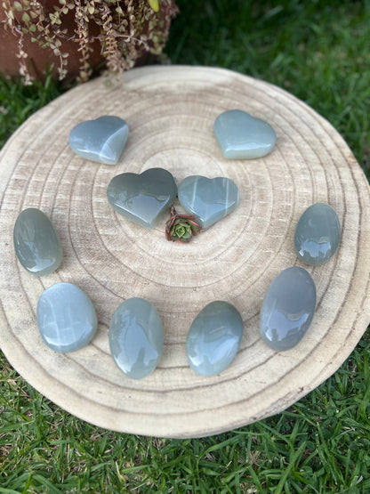 Green moonstone palm stones