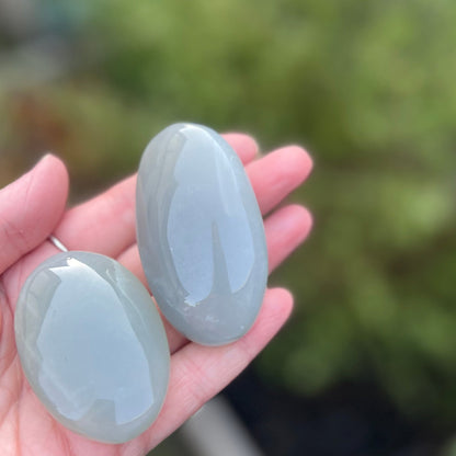 Green moonstone palm stones